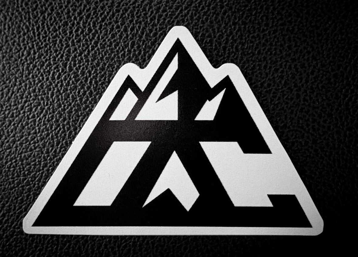 Ocean Crest black and white triangular mountain decal on grey surface