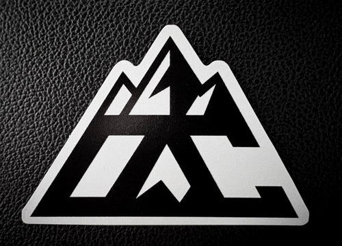 Ocean Crest black and white triangular mountain decal on grey surface